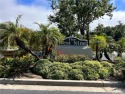 Enjoy the expansive views of the adjacent golf course with its for sale in Laguna Niguel California Orange County County on GolfHomes.com