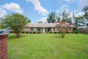 Welcome to this charming 4-bedroom, 2-bath brick home located in for sale in Lake Park Georgia Lowndes County County on GolfHomes.com