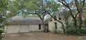 THIS IS A BEAUTIFUL HOME ON A FAN SHAPED 0.29 AC CUL-DE-SAC LOT for sale in Wimberley Texas Hays County County on GolfHomes.com