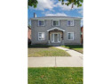 Stunning totally renovated classic center entrance brick for sale in Detroit Michigan Wayne County County on GolfHomes.com
