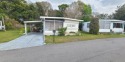 CENTRALLY LOCATED 2-BEDROOM, 1-BATHROOM HOME IN A GATED, 55+ for sale in Lakeland Florida Polk County County on GolfHomes.com