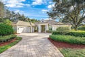 This airy custom built home sits on a half acre lot with for sale in Palm Beach Gardens Florida Palm Beach County County on GolfHomes.com