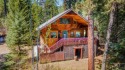 Escape to peace and privacy in this spacious 3-bedroom for sale in Garden Valley Idaho Boise County County on GolfHomes.com