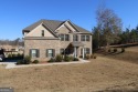 Welcome to 1725 Wesminster Circle, a stunning 2-story property for sale in Griffin Georgia Spalding County County on GolfHomes.com