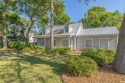 This stunning Cape Cod-style home features 4 bedrooms, 2 1/2 for sale in Saint Simons Georgia Glynn County County on GolfHomes.com