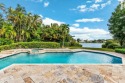 Amazing and stunning lake, pool and garden views are enjoyed for sale in Palm Beach Gardens Florida Palm Beach County County on GolfHomes.com