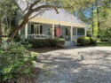 Step into a slice of Southern charm.  Imagine cozy evenings by for sale in Saint Simons Georgia Glynn County County on GolfHomes.com