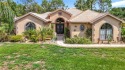 Stunning 3 bedrooms + office, 3 bath + 3 car garage Cabana Pool for sale in Homosassa Florida Citrus County County on GolfHomes.com