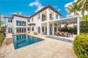 Welcome to this stunning contemporary oasis in the gated for sale in Miami Florida Miami-Dade County County on GolfHomes.com