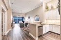 Absolutely beautiful coach home, move-in ready with numerous for sale in Bonita Springs Florida Lee County County on GolfHomes.com