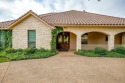 Welcome to the Texas Tuscan! Absolutely gorgeous custom open for sale in Cleburne Texas Johnson County County on GolfHomes.com
