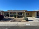 Welcome to your desert oasis! Set against spectacular views of for sale in Palm Desert California Riverside County County on GolfHomes.com