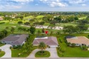 Welcome to your dream home in the prestigious Yacht & Country for sale in Stuart Florida Martin County County on GolfHomes.com