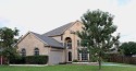 This golf course lot boasts a rare 6 car driveway and dual for sale in Sachse Texas Collin County County on GolfHomes.com