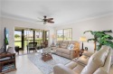 This spectacular END UNIT has *Welcome to Naples, Florida* for sale in Naples Florida Collier County County on GolfHomes.com