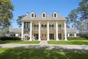 Perfectly positioned on two premier golf course lots in for sale in Covington Louisiana St. Tammany Parish County on GolfHomes.com
