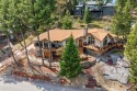If you want beautiful Swan Mountain views from almost every room for sale in Bigfork Montana Flathead County County on GolfHomes.com