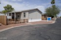 Move-in ready and spacious, this multi-wide home in Shamrock for sale in Glendale Arizona Maricopa County County on GolfHomes.com