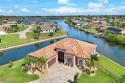 Custom-Built Waterfront Home with 307 Feet of Panoramic Water for sale in Cape Coral Florida Lee County County on GolfHomes.com