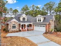 This stunning, custom-built home by Douglas Builders is ready for sale in Ocean Isle Beach North Carolina Brunswick County County on GolfHomes.com