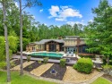 Premier lake front living in the exclusive, gated golf community for sale in Loxley Alabama Baldwin County County on GolfHomes.com