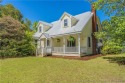 Welcome to 1768 Airport Road! A charming home with modern for sale in Whispering Pines North Carolina Moore County County on GolfHomes.com