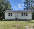 PRICED TO SELL THIS FIXER UPPER IS WAITING FOR YOU.  This sweet for sale in Southport North Carolina Brunswick County County on GolfHomes.com