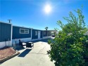 This delightful double wide mobile home is nestled in the for sale in Thousand Palms California Riverside County County on GolfHomes.com