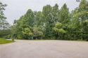 Indulge in the realization of your dream home on this expansive for sale in Flowery Branch Georgia Hall County County on GolfHomes.com