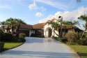 Nestled at the head of Number 2 hole so the view can be long and for sale in Stuart Florida Martin County County on GolfHomes.com