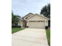 Welcome to this beautifully maintained 3-bedroom, 2-bath home for sale in Lakeland Florida Polk County County on GolfHomes.com