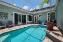 This beautiful courtyard villa is high and dry. NO WATER OR for sale in Bonita Springs Florida Lee County County on GolfHomes.com