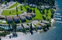 Breathtaking lake & mountain views await you in this updated for sale in Rathdrum Idaho Kootenai County County on GolfHomes.com