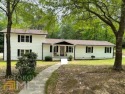 THIS ONE HAS 2 SEPARATE FULL KITCHENS / Mother in Laws Suite / for sale in Newnan Georgia Coweta County County on GolfHomes.com