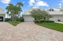 Discover the epitome of waterfront living in this perfect for sale in Jupiter Florida Palm Beach County County on GolfHomes.com