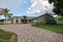 Spacious 4 - bedroom home on golf course with cozy fireplace is for sale in Rockledge Florida Brevard County County on GolfHomes.com