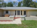 Welcome to Rainbow Springs! This charming 2-bedroom, 2-bath home for sale in Dunnellon Florida Marion County County on GolfHomes.com