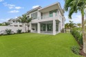 Situated on a spacious end lot in Juno Beach, this new for sale in Juno Beach Florida Palm Beach County County on GolfHomes.com