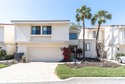 STUNNING COASTAL 3 BEDROOM, 2.5 BATH TOWNHOME WITH 1915 HSF OF for sale in St. Petersburg Florida Pinellas County County on GolfHomes.com