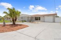 Live the Salt Life in this beautifully maintained, move-in ready for sale in Hudson Florida Pasco County County on GolfHomes.com