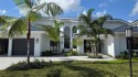Located in Boca Grove, this charming remodel features a for sale in Boca Raton Florida Palm Beach County County on GolfHomes.com
