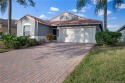 Discover this beautifully updated 3-bedroom, 2-bath, 2-car for sale in Port Saint Lucie Florida Saint Lucie County County on GolfHomes.com