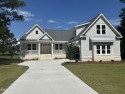 Gorgeous new construction on the golf course in Crow Creek for sale in Calabash North Carolina Brunswick County County on GolfHomes.com