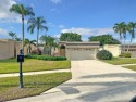 Light, bright and airy move in ready. 3 Bedroom, 2 and 1/2 Bath for sale in Lake Worth Florida Palm Beach County County on GolfHomes.com