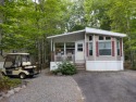 Enjoy the spring, summer and fall fun in this 3 season resort for sale in Casco Maine Cumberland County County on GolfHomes.com