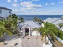 Discover your beachfront oasis directly on Tampa Bay! Step out for sale in Anna Maria Florida Manatee County County on GolfHomes.com