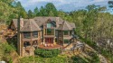 Surrounded by the stunning beauty of its 1.5-acre landscape, 176 for sale in Six Mile South Carolina Pickens County County on GolfHomes.com