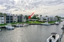 Stuart living at its finest! Enjoy gorgeous marina views from for sale in Stuart Florida Martin County County on GolfHomes.com