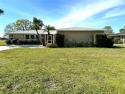 Golfing enthusiasts take note!  Located on the 8th fairway of for sale in Rotonda West Florida Charlotte County County on GolfHomes.com