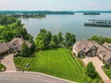 Embrace the luxury of lakeside living in WindRiver, a burgeoning for sale in Lenoir City Tennessee Loudon County County on GolfHomes.com